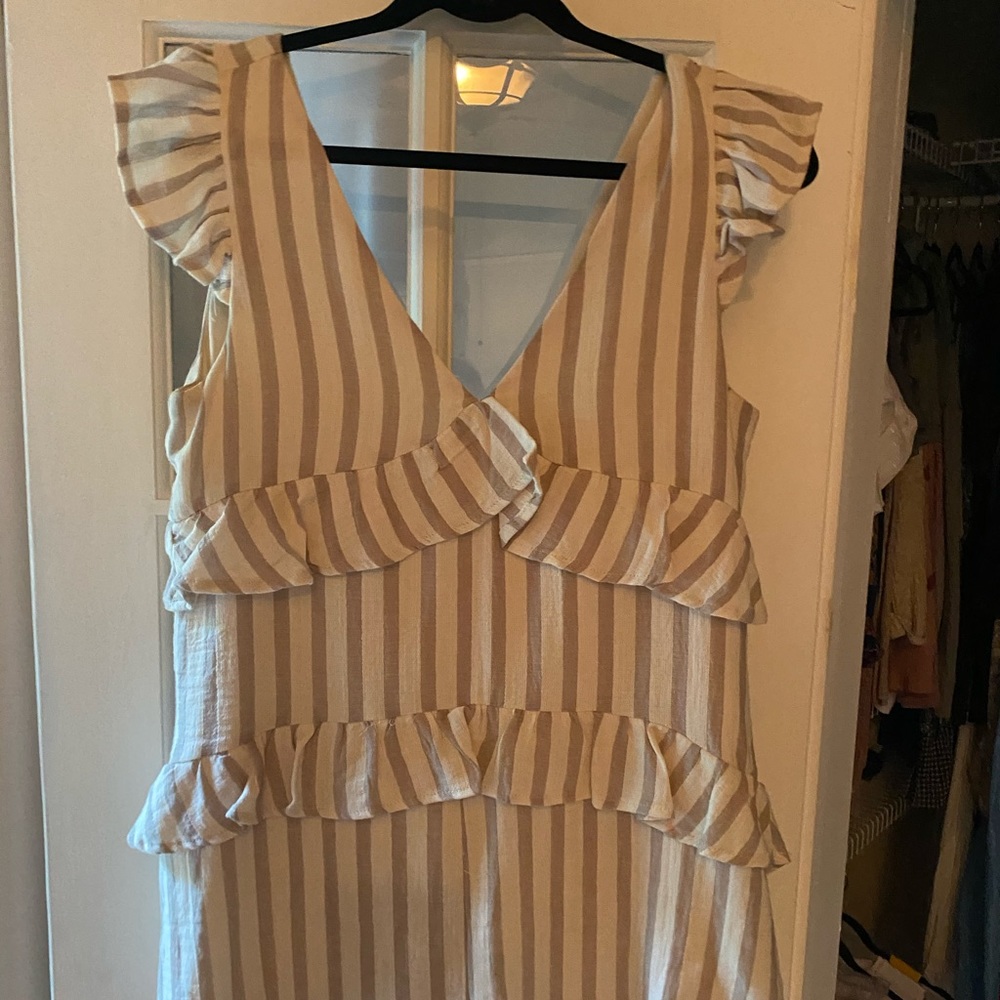 tan and cream boutique romper with ruffles